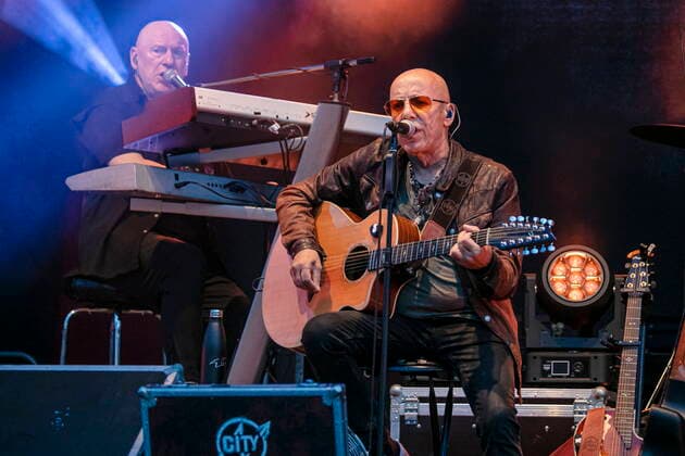 Manfred Hennig keyboards and Toni Krahl vocals, guitar L R of the group CITY founded in 1972 in East Berlin GDR during the Candlelight Open Air rock concert live in Coswig