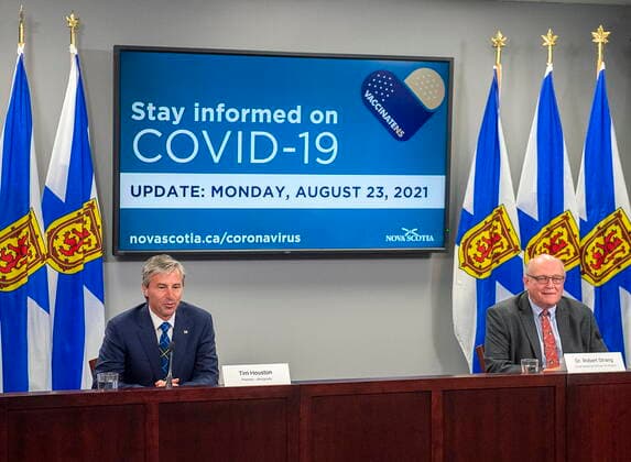August 23, 2021, HALIFAX, NS, Canada: Premier-designate Tim Houston, left, attends his first COVID-19 briefing with Dr. Robert Strang, chief medical officer of health, after the Progressive Conservatives won last week s provincial election, in Halifax on Monday, Aug. 23, 2021. HALIFAX Canada - ZUMAc35_ 20210823_zaf_c35_019 Copyright: xAndrewxVaughanx