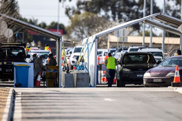 VICTORIA CORONAVIRUS COVID19, People queue in their cars for a COVID test at a drive-through testing site at Shepparton Sports Precinct in Shepparton, Victoria, Tuesday, August 24, 2021. The entire state of Victoria is back in lockdown as authorities scramble to contain a rapidly growing cluster of COVID-19 in the regional city of Shepparton. ( NO ARCHIVING, EDITORIAL USE ONLY, NO USE IN BOOKS WITHOUT CONSENT MELBOURNE VIC AUSTRALIA  Copyright: xDANIELxPOCKETTx 20210824001569364174