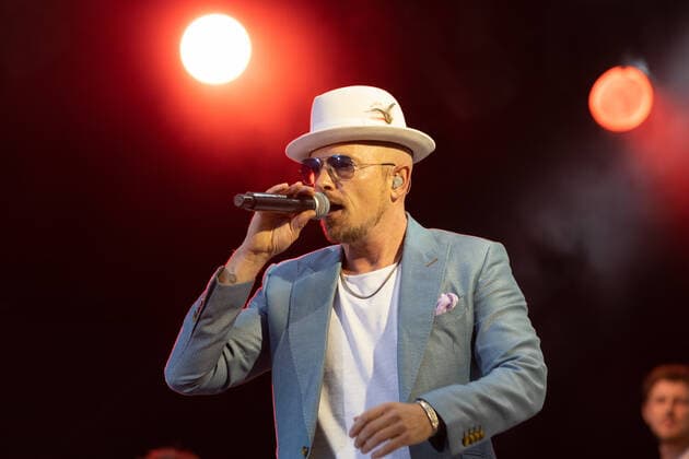 The Hip Hop Funk and Soul musician Jan Delay Jan Philipp Eißfeldt and the band Disko No 1 performing live at the Kunst Rasen Bonn Gronau Organizer ELHart Promotion GmbH Bonn Gronau NRW Germany