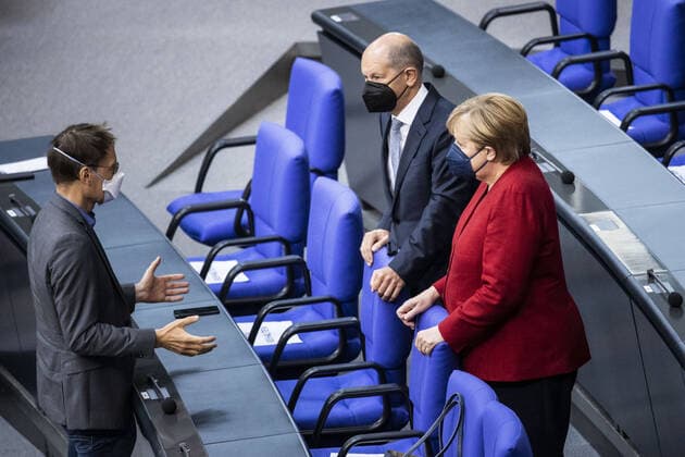 L R Karl Lauterbach, SPD, Olaf Scholz, Federal Minister of Finance, and Angela Merkel, Federal Chancellor, recorded during a special session on the situation in Afghanistan in the German Bundestag in Berlin, 25 08 2021 Berlin Germany Copyright: xFlorianxGaertner photothek.dex
