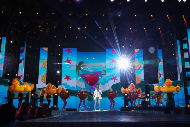 SOCHI, RUSSIA - AUGUST 25, 2021: Comedian Alexander Revva as Artur Pirozhkov (C) performs in a gala concert on the closing day of the 2021 New Wave Song Contest, an international competition for young pop music performers. Eleven singers representing nine countries took part in the contest, which ran from 19 to 25 August. Vyacheslav Prokofyev TASS  TS10DC51