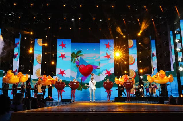 SOCHI, RUSSIA - AUGUST 25, 2021: Comedian Alexander Revva as Artur Pirozhkov (C) performs in a gala concert on the closing day of the 2021 New Wave Song Contest, an international competition for young pop music performers. Eleven singers representing nine countries took part in the contest, which ran from 19 to 25 August. Vyacheslav Prokofyev TASS  TS10DC54