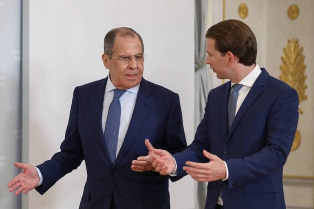 VIENNA, AUSTRIA - AUGUST 25, 2021: Russia s Minister of Foreign Affairs Sergei Lavrov (L) and Austria s Chancellor Sebastian Kurz talk during a meeting at the Federal Chancellery. Russian Ministry of Foreign Affairs TASS  TS10DC60