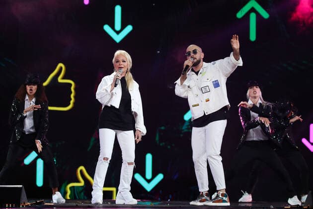 SOCHI, RUSSIA - AUGUST 25, 2021: Guest singer Larisa Dolina (L front) performs in a gala concert on the closing day of the 2021 New Wave Song Contest, an international competition for young pop music performers. Eleven singers representing nine countries took part in the contest, which ran from 19 to 25 August. Vyacheslav Prokofyev TASS  TS10DCA1