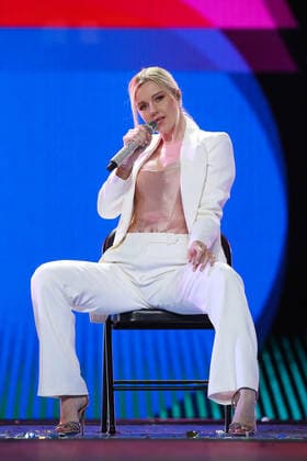 SOCHI, RUSSIA - AUGUST 25, 2021: Guest singer Yulianna Karaulova performs in a gala concert on the closing day of the 2021 New Wave Song Contest, an international competition for young pop music performers. Eleven singers representing nine countries took part in the contest, which ran from 19 to 25 August. Vyacheslav Prokofyev TASS  TS10DCA3