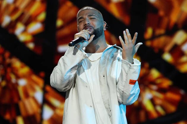 SOCHI, RUSSIA - AUGUST 25, 2021: Guest singer Artyom Kacher performs in a gala concert on the closing day of the 2021 New Wave Song Contest, an international competition for young pop music performers. Eleven singers representing nine countries took part in the contest, which ran from 19 to 25 August. Vyacheslav Prokofyev TASS  TS10DCA9