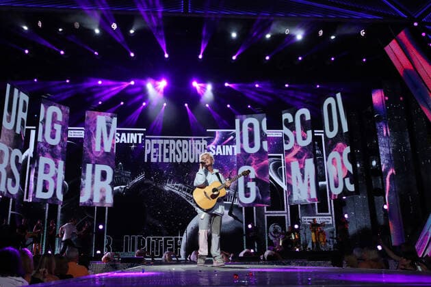 SOCHI, RUSSIA - AUGUST 25, 2021: Guest singer Vanya Dmitriyenko performs in a gala concert on the closing day of the 2021 New Wave Song Contest, an international competition for young pop music performers. Eleven singers representing nine countries took part in the contest, which ran from 19 to 25 August. Vyacheslav Prokofyev TASS  TS10DCAE