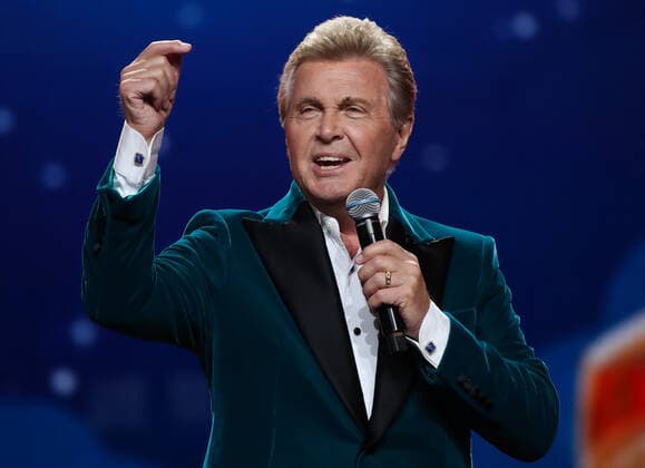 SOCHI, RUSSIA - AUGUST 25, 2021: Guest singer Lev Leshchenko performs in a gala concert on the closing day of the 2021 New Wave Song Contest, an international competition for young pop music performers. Eleven singers representing nine countries took part in the contest, which ran from 19 to 25 August. Vyacheslav Prokofyev TASS  TS10DCB4