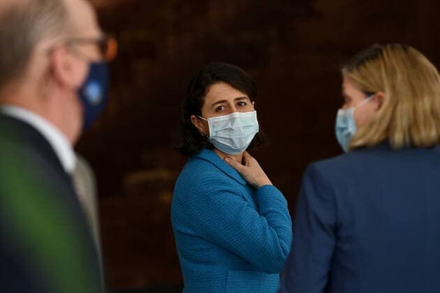 GLADYS BEREJIKLIAN COVID19 PRESSER, NSW Premier Gladys Berejiklian (centre) wears a face mask after a press conference to provide a COVID-19 update, in Sydney, Thursday, August 26, 2021. NSW recorded 1029 new locally acquired cases of COVID-19 as the entire state continues in lockdown. ( NO ARCHIVING, EDITORIAL USE ONLY, NO USE IN BOOKS WITHOUT CONSENT SYDNEY NSW AUSTRALIA  Copyright: xBIANCAxDExMARCHIx 20210826001569813949