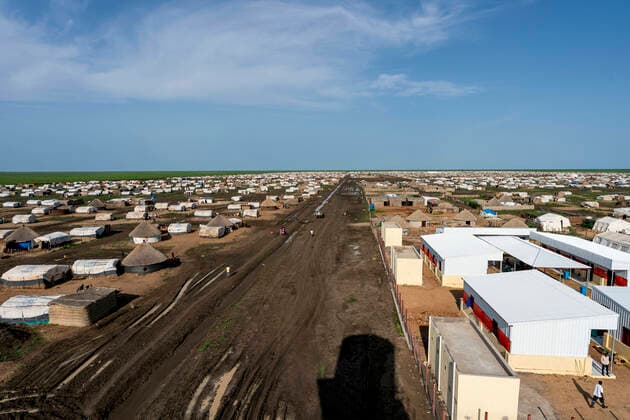August 24, 2021, Gedaref, Washington, Sudan: A mud-filled street separates two of twelve settlement blocks Tuneidba Refugee Camp near Gedaref, Sudan, as seen from atop a not yet functional water tower...The 20,000 Tigrayan refugees in this camp are part of the estimated 200,000 people who have fled Ethiopia and Eritrea following attaches by violent militias. Gedaref Sudan - ZUMAb333 20210824_znp_b333_029 Copyright: xGreggxBrekkex