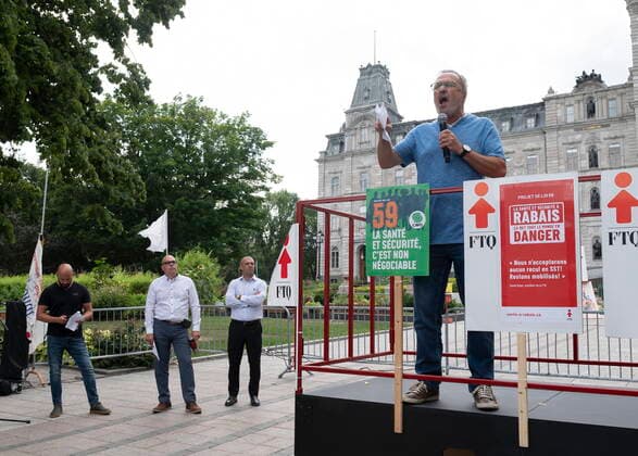 August 26, 2021, QUEBEC, PQ, Canada: FTQ union leader Daniel Boyer speaks to a coalition of union workers demonstrating against Bill 59 on health and security for workers, at the provincial legislature in Quebec City, Thursday, Aug. 26, 2021. QUEBEC Canada  - ZUMAc35_ 20210826_zaf_c35_018 Copyright: xJacquesxBoissinotx