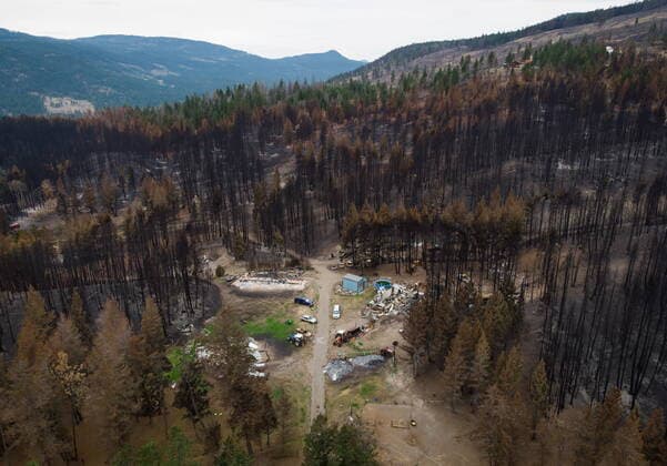 August 26, 2021, MONTE LAKE, BC, Canada: Burnt trees and a property with structures that were destroyed by the White Rock Lake wildfire earlier this month are seen, in Monte Lake, B.C., on Thursday, August 26, 2021. MONTE LAKE Canada  - ZUMAc35_ 20210826_zaf_c35_072 Copyright: xDarrylxDyckx