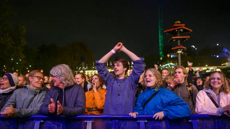 The audience for the Danish band When Saints Go Machine with Nikolaj Manuel Vonsild in front plays up to Havefest paa Plaenen in Tivoli on Friday 27 August 2021 Havefest replaces Fredagsrock, which has been canceled due to the Covid 19 Corona crisis, Copenhagen  Copyright: TorbenxChristensen TorbenxChristensenx COP114 spdk20210828-010422-L