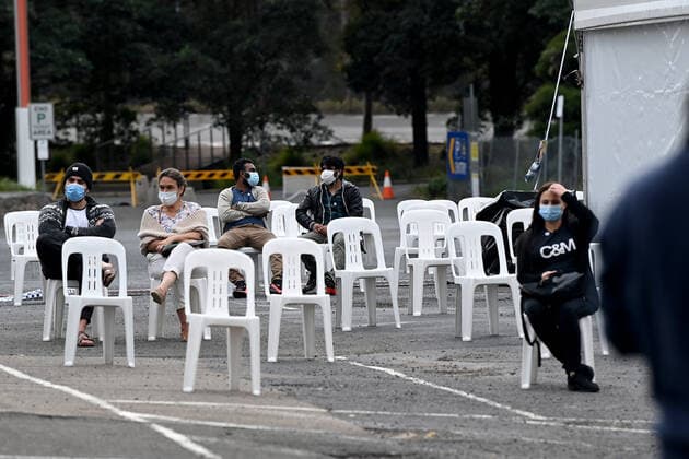NSW CORONAVIRUS COVID19, Members of the public wear face masks as they wait at the overflow tent at the NSW Health Vaccination Hub at Olympic Park in Sydney, Saturday, August 28, 2021. All of NSW is under strict lockdown after a record number of COVID-19 cases that have authorities concerned for the healthcare system. ( NO ARCHIVING, EDITORIAL USE ONLY, NO USE IN BOOKS WITHOUT CONSENT SYDNEY NSW AUSTRALIA  Copyright: xBIANCAxDExMARCHIx 20210828001570382010
