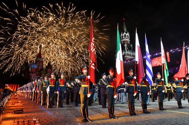MOSCOW, RUSSIA â€“ AUGUST 27, 2021: Soldiers with the flags of Mexico, Qatar, Greece and Belarus are seen at the opening of the 2021 Spasskaya Tower International Military Music Festival in Red Square. Vladimir Gerdo TASS  TS10E07F