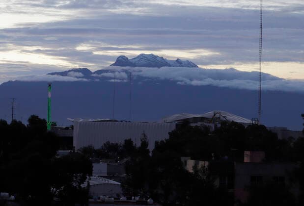 Popocatepetl Volcano In Mexico Registers Activity View of Iztaccihuatl Volcano during sunrise and COVID-19 health emergency in Mexico. Mexico City Mexico vieyra-notitle210829_npcjA  Copyright: xGerardoxVieyrax