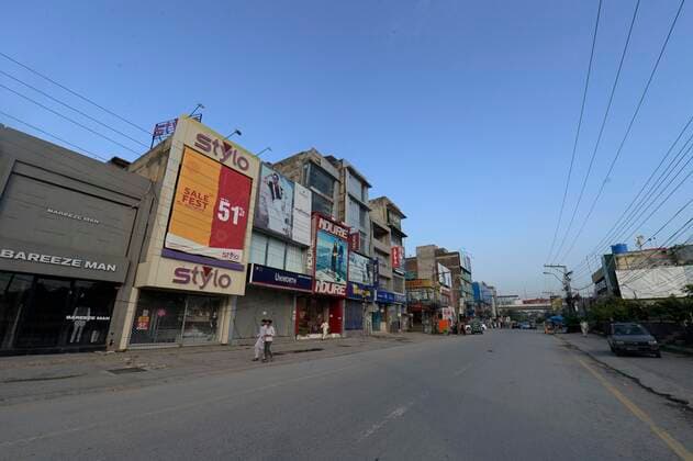 (210830) -- RAWALPINDI, Aug. 30, 2021 -- Photo taken on Aug. 29, 2021 shows a closed market during COVID-19 restrictions in Rawalpindi of Pakistan s Punjab Province. Pakistan on Sunday extended restrictions to 27 cities from the earlier 13 cities to control the serious fourth wave of COVID-19 in the country, the National Command and Operation Center (NCOC) said on Sunday. ) PAKISTAN-RAWALPINDI-COVID-19-RESTRICTION AhmadxKamal 