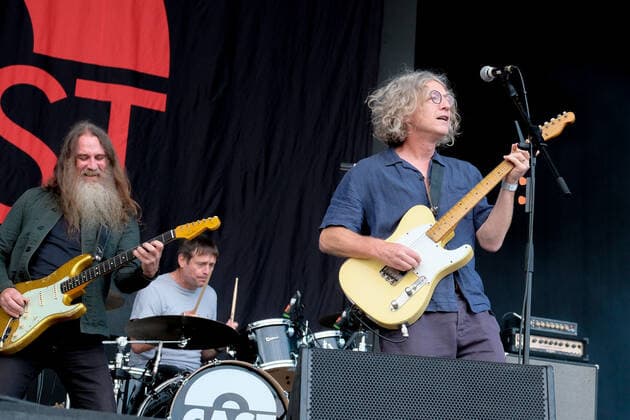 August 29, 2021, Portsmouth, Hampshire, United Kingdom: John Timothy Powers, lead vocalist and guitarist with English Indie alternative rock band, Liam Skin Tyson, guitarist and Keith O Neill drummer with Cast perform live on stage at Victorious Festival. Portsmouth United Kingdom - ZUMAs197 20210829_zaa_s197_370 Copyright: xDawnxFletcher-Parkx