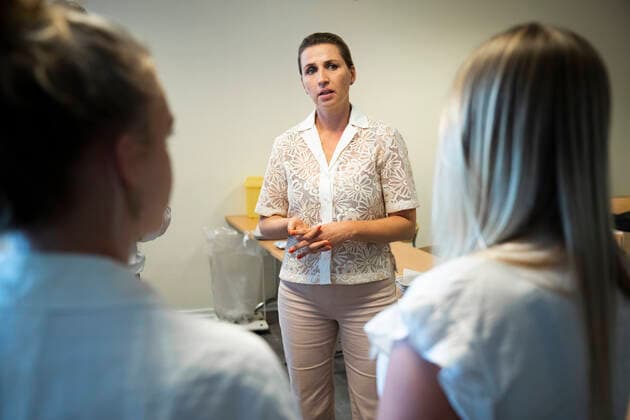 The Prime Minister Mette Frederiksen and Director of the National Board of Health Soeren Brostroem visit the emergency vaccination team at Broendby Gymnasium and have a tour and a chat with the students at the high school, Tuesday 31 August 2021, Copenhagen Denmark  Copyright: MartinxSylvestx COP105 spdk20210831-165745-L