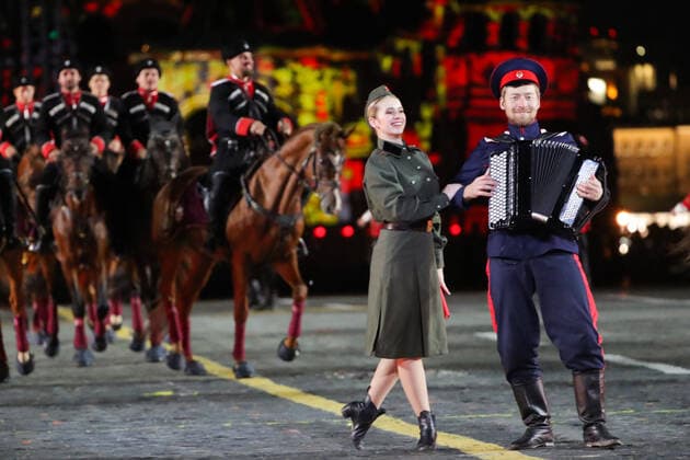 MOSCOW, RUSSIA â€“ SEPEMBER 5, 2021: Moscow Cossack Choir and Kremlin Equestrian School members perform at the closing of the 2021 Spasskaya Tower International Military Music Festival in Moscow s Red Square. Sergei Karpukhin TASS  TS10F3CE