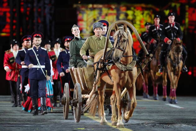 MOSCOW, RUSSIA â€“ SEPEMBER 5, 2021: Moscow Cossack Choir and Kremlin Equestrian School members perform at the closing of the 2021 Spasskaya Tower International Military Music Festival in Moscow s Red Square. Sergei Karpukhin TASS  TS10F3EF