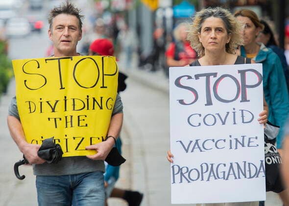 September 5, 2021, Montreal, PQ, Canada: People attend a protest against the Quebec governmentÃ¢â‚¬â ¢s measures to help curb the spread of COVID-19 in Montreal, Sunday, September 5, 2021, as the COVID-19 pandemic continues in Canada and around the world. Montreal Canada  - ZUMAc35_ 20210905_zaf_c35_040 Copyright: xGrahamxHughesx