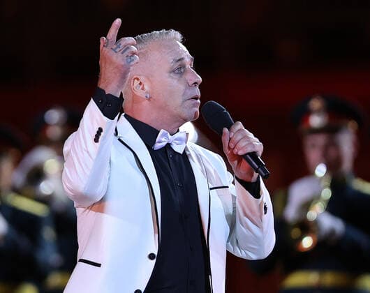 Lead vocalist Till Lindemann of the German rock band Rammstein performs at the closing of the 2021 Spasskaya Tower International Military Music Festival in Moscow s Red Square.