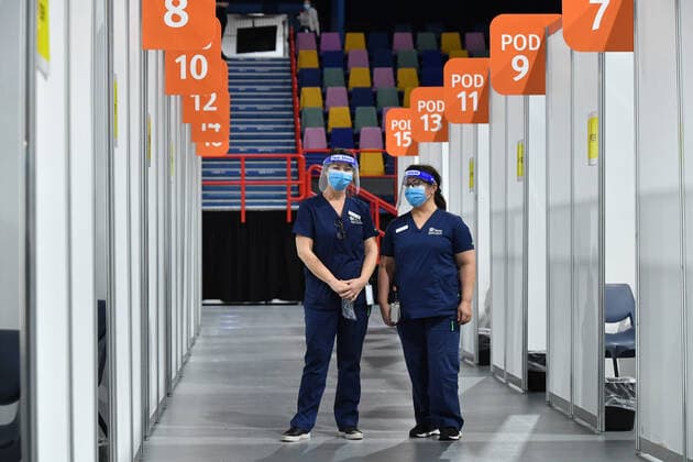 QLD CORONAVIRUS COVID19, Health care staff are seen at the new vaccination hub at the Brisbane Entertainment Centre in Brisbane, Tuesday, September 7, 2021. The Queensland government is trying to ramp up COVID-19 vaccinations before Delta reappears in the state, after bringing another outbreak under control. ( NO ARCHIVING, EDITORIAL USE ONLY, NO USE IN BOOKS WITHOUT CONSENT BRISBANE QLD AUSTRALIA  Copyright: xDARRENxENGLANDx 20210907001573518330