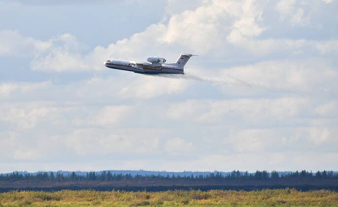 KRASNOYARSK TERRITORY, RUSSIA â€“ SEPTEMBER 7, 2021: A Beriev Be-200 multipurpose amphibious aircraft of the Russian Emergencies Ministry takes part in an emergency prevention drill in the Arctic, in the port of Dudinka. The interagency research drills in the Arctic are to be held by the Russian Emergencies Ministry on September 7-8 by order of the Russian President; 12 possible emergency cases are to be worked out. Maxim Grigoryev TASS  TS10F6E9