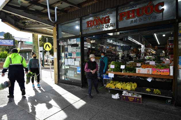 NSW CORONAVIRUS COVID19, Shoppers wearing a face mask passes a store at Marrickville, Sydney, Thursday, September 9, 2021. Glebe, Waterloo, Redfern and Marrickville have been identified by health officials as suburbs of concern, with rising COVID-19 cases and low vaccination rates. ( NO ARCHIVING, EDITORIAL USE ONLY, NO USE IN BOOKS WITHOUT CONSENT SYDNEY NSW AUSTRALIA  Copyright: xJOELxCARRETTx 20210909001574149131