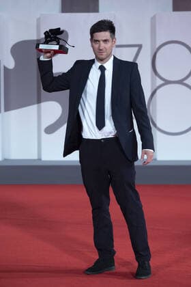 September 12, 2021, Venice, Italy: Director David Adler poses with the Best VR Story Award for End Of Night during the Winners Red Carpet as part of the 78th Venice International Film Festival in Venice, Italy on September 11, 2021. Paolo Cotello imageSPACE Venice Italy - ZUMAs181 20210912_zea_s181_068 Copyright: xImagespacex