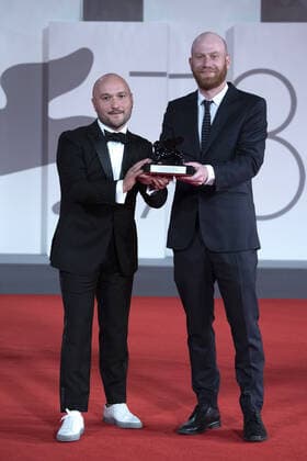September 12, 2021, Venice, Italy: Lucas Engel poses with Orizzonti Award for the Best Short Film for Los Huesos during the Winners Red Carpet as part of the 78th Venice International Film Festival in Venice, Italy on September 11, 2021. Paolo Cotello imageSPACE Venice Italy - ZUMAs181 20210912_zea_s181_059 Copyright: xImagespacex