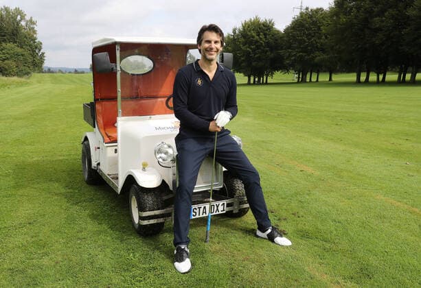 Tabaluga Golf Cup 2021 by Michael Roll For the 27th time Michael Roll organized the Tabaluga Golf Cup in favor of his Tabaluga Foundation the actor Florian Odendahl sitting on a golf cart, Tutzing Bavaria Germany Golfclub Tutzing
