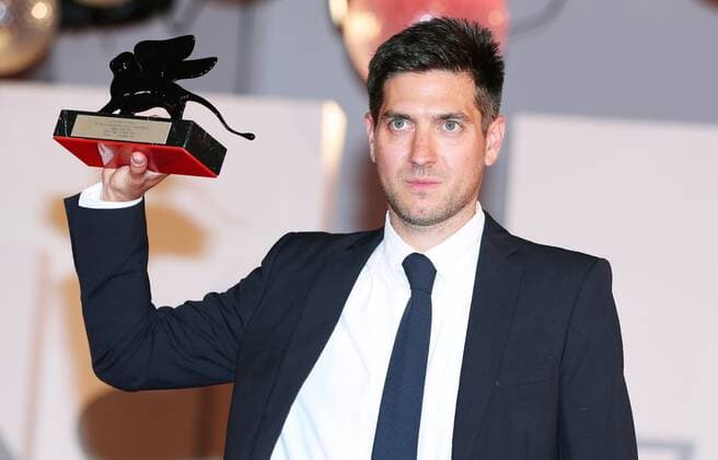 Italy Venice Film Festival 6649379 11.09.2021 Director David Adler poses with the Best VR Story Award for End Of Night at the awards winner photocall during the 78th Venice International Film Festival, in Venice, Italy. Ekaterina Chesnokova Sputnik Venice Italy  Copyright: xEkaterinaxChesnokovax