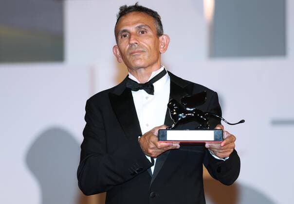 Italy Venice Film Festival 6649287 11.09.2021 Director Michelangelo Frammartino poses with the Special Jury Prize for Il Buco (The Hole) at the awards winner photocall during the 78th Venice International Film Festival in Venice, Italy. Ekaterina Chesnokova Sputnik Venice Italy  Copyright: xEkaterinaxChesnokovax