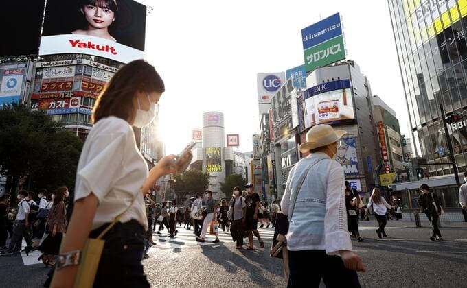 Scene of Tokyo amid coronavirus pandemic People walk in Tokyo s Shibuya area on Sept. 13, 2021, amid the coronavirus pandemic. The COVID-19 state of emergency covering 21 of Japan s 47 prefectures had been slated to end Sept. 12 but extended through Sept. 30 in 19 prefectures including Tokyo, Osaka and Hokkaido.  A14AA0000842000P