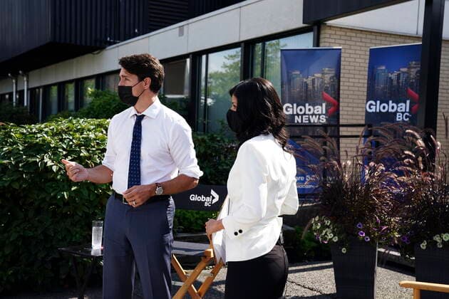 September 13, 2021, Burnaby, B.C, Canada: Liberal leader Justin Trudeau prepares to take part in an interview with Global reporter Neetu Garcha in Burnaby, B.C., on Monday, Sept. 13, 2021. The interview was set to take part outside but had to be moved inside due to the a lone protester heckling Trudeau. Burnaby Canada  - ZUMAc35_ 20210913_zaf_c35_068 Copyright: xSeanxKilpatrickx
