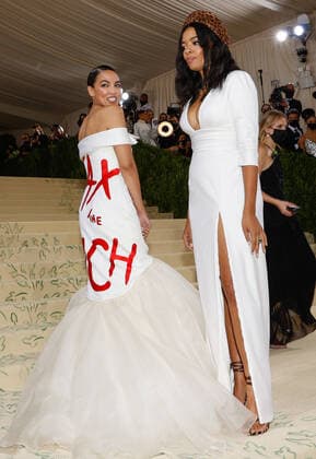 U.S. Congress Representative Alexandria Ocasio-Cortez and Aurora James arrive for The Met Gala at The Metropolitan Museum of Art celebrating the opening of In America: A Lexicon of Fashion in New York City on Monday, September 13, 2021.  NYP20210913576 JOHNxANGELILLO