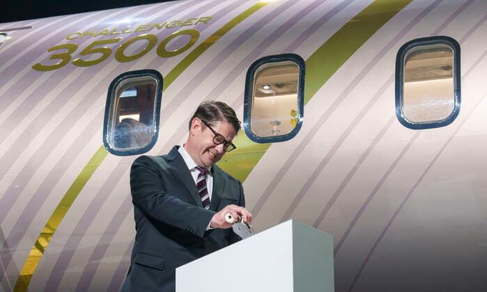 September 14, 2021, Montreal, PQ, Canada: Bombardier president and CEO Eric Martel jokingly grimaces as he pushes a throttle lever to launch the new Challenger 3500 in Montreal on Tuesday, September 14, 2021. Montreal Canada  - ZUMAc35_ 20210914_zaf_c35_003 Copyright: xPaulxChiassonx