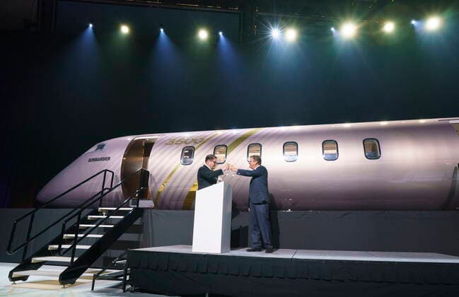 September 14, 2021, Montreal, PQ, Canada: Bombardier president and CEO Eric Martel and chairman of the board Pierre Beaudoin toast in front of a scale model of the new Challenger 3500 in Montreal on Tuesday, September 14, 2021. Montreal Canada  - ZUMAc35_ 20210914_zaf_c35_004 Copyright: xPaulxChiassonx