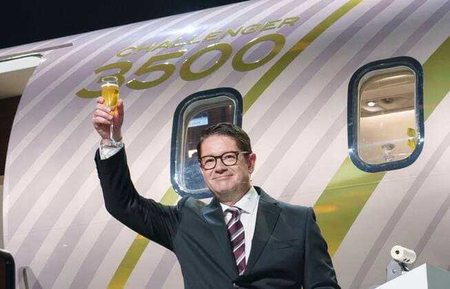 September 14, 2021, Montreal, PQ, Canada: Bombardier president and CEO Eric Martel raises his glass in front of a scale model of the new Challenger 3500 in Montreal on Tuesday, September 14, 2021. Montreal Canada  - ZUMAc35_ 20210914_zaf_c35_010 Copyright: xPaulxChiassonx