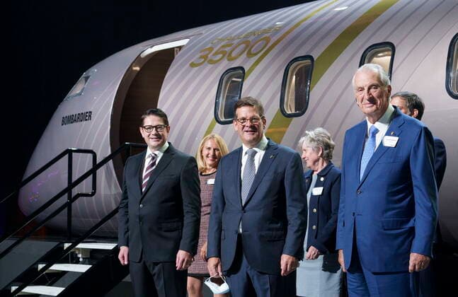 September 14, 2021, Montreal, PQ, Canada: Bombardier president and CEO Eric Martel, left, chairman of the board Pierre Beaudoin, centre, and former CEO Laurent Beaudoin stand in front of a scale model of the new Challenger 3500 in Montreal on Tuesday, September 14, 2021. Montreal Canada - ZUMAc35_ 20210914_zaf_c35_013 Copyright: xPaulxChiassonx