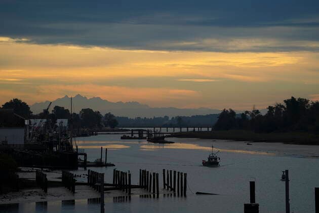 September 14, 2021, Richmond, B.C, Canada: A boat makes its way along Steveston Harbour in Richmond, B.C., on Tuesday, Sept. 14, 2021. Richmond Canada  - ZUMAc35_ 20210914_zaf_c35_015 Copyright: xSeanxKilpatrickx