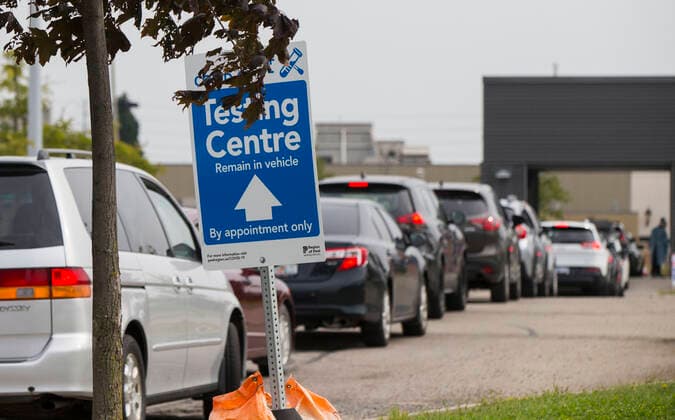 (210914) -- MISSISSAUGA (CANADA), Sept. 14, 2021 -- People wait in their vehicles to have COVID-19 tests at a drive-thru COVID-19 testing center in Mississauga, Ontario, Canada, on Sept. 14, 2021. Canada s cumulative COVID-19 cases surpassed 1,550,000 as of Tuesday afternoon, with the total hitting 1,553,007, including 27,252 deaths, according to CTV. (Photo by Xinhua) CANADA-ONTARIO-MISSISSAUGA-COVID-19-CASES ZouxZheng