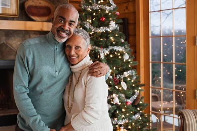 Diversity, Weihnachten Mature couple embracing by Christmas tree, portrait, 08.12.2011, Copyright: xChristopherxRobbinsx, model released, wearing,looking at camera,gray hair,front view,portrait,waist up,traditional,festive,loving,romance,togetherness,affection,confidence,friendship,relaxation,christmas decoration,christmas tree,mature adult,50 to 54 years,african american ethnicity,mixed race ethnicity,multi-ethnic group,female,woman,mature woman,male,man,mature man,heterosexual couple,two people,house interior,window,indoors,living room,winter,communication,christmas,arm around,smiling,standing,short hair,lifestyle,leisure,traditional culture,mature couple,December 2011 Release,Standing,African Descent,African American Ethnicity,Mixed Race Person,Multi-Ethnic Ref:IS099I1JF