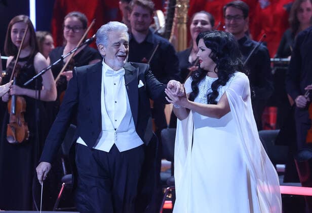 MOSCOW, RUSSIA - SEPTEMBER 18, 2021: Operatic tenor Placido Domingo (L) and operatic soprano Anna Netrebko perform in a concert marking Netrebko s 50th birthday, at the State Kremlin Palace. Vladimir Gerdo TASS  TS111086