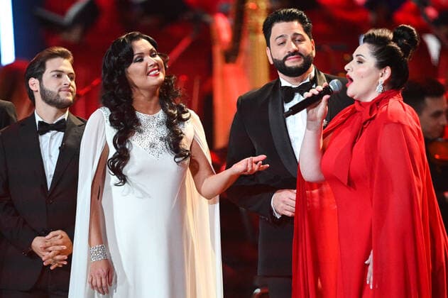 Russia Opera Singer Netrebko Anniversary 6653999 18.09.2021 Opera singer Anna Netrebko, second left, reacts during a concert marking her 50th birthday, at the State Kremlin Palace, Moscow, Russia. Ramil Sitdikov Sputnik Moscow Russia  Copyright: xRamilxSitdikovx