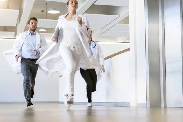 Male and female doctors running along hospital corridor, 18.01.2017, Copyright: xsuedhangx, model released, , property released, wearing,running,working,front view,full length,anticipation,responsibility,urgency,skill,teamwork,on the go,20 to 24 years,caucasian ethnicity,woman,young woman,man,young man,colleague,three people,medical occupation,doctor,corridor,indoors,hospital,lab coat,medicine,emergency,both male and female,healthcare,en route,junior doctor,January 2017 Release,Running,Working,Caucasian Ethnicity,Young Adult,20-24 Years,Female,Women,Young Women,Young Adult Woman,Male,Men,Young Men,Healthcare Occupation,Physician,Businesspeople,Anticipation,On The Move,Responsibility,Skill,Teamwork,Urgency,Small Group Of People,Three Peopl Ref:IS09B417H