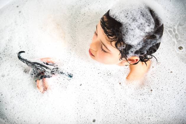 Boy playing with toy dinosaur in bubble bath, elevated view, 04.04.2017, Copyright: xBonfantixDiegox, model released, , property released, holding,playing,elevated view,at home,childhood,concentration,focus concept,clean,creativity,harmony,hygiene,imagination,innocence,happiness,child,male,boy,only one boy,one person,bathtub,bathroom,bathtime,bubble,bath toy,7 to 8 years,April 2017 Release,Cleaning,Bathing,Playing,Thinking,Concentration,Holding,Child,Male,Boys,Childhood,Creativity,Harmony,Hygiene,Imagination,Innocence,Wellbeing,Happiness,Clean,One Person,High Angle View,Bathtub,Symbol,Orthographic Symbol,Numeral,Home Interior,Hygiene Room,Bathroom,Bubble,Domestic Life,Boy Ref:IS09B5CZ4